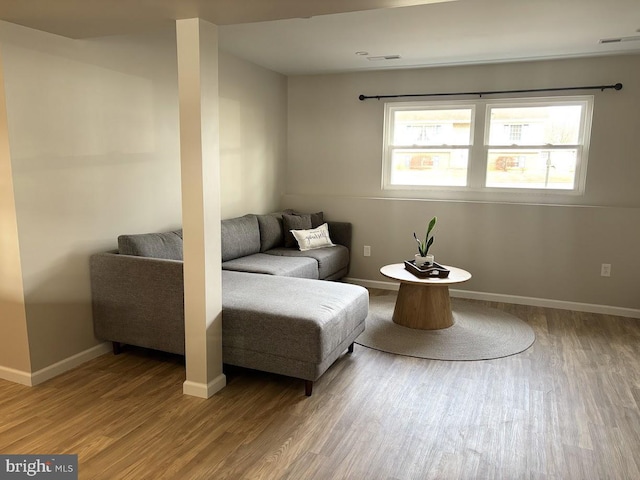 living area featuring hardwood / wood-style flooring