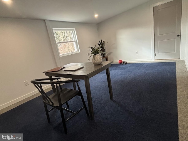 view of carpeted dining space