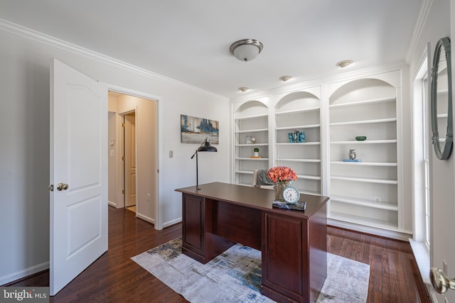 office area with crown molding, dark hardwood / wood-style flooring, and built in features