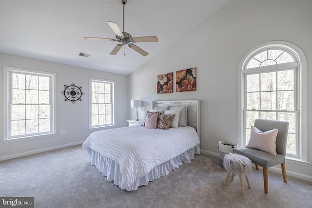 carpeted bedroom featuring ceiling fan and lofted ceiling