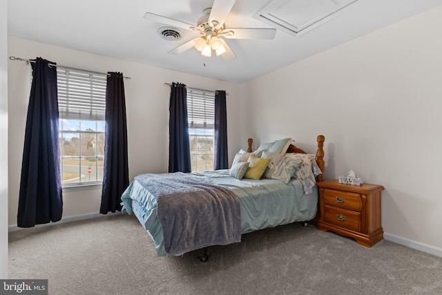 carpeted bedroom with ceiling fan