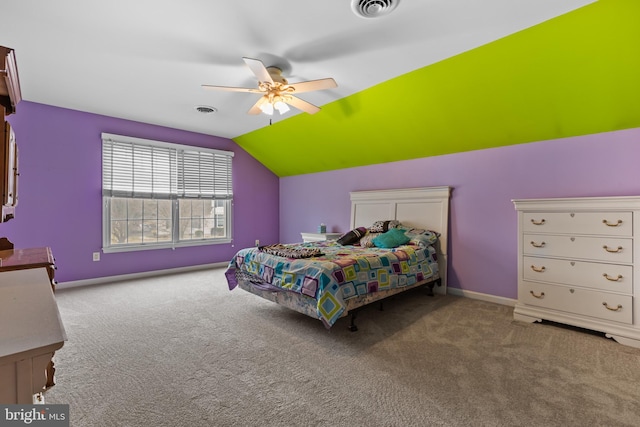 carpeted bedroom featuring lofted ceiling and ceiling fan