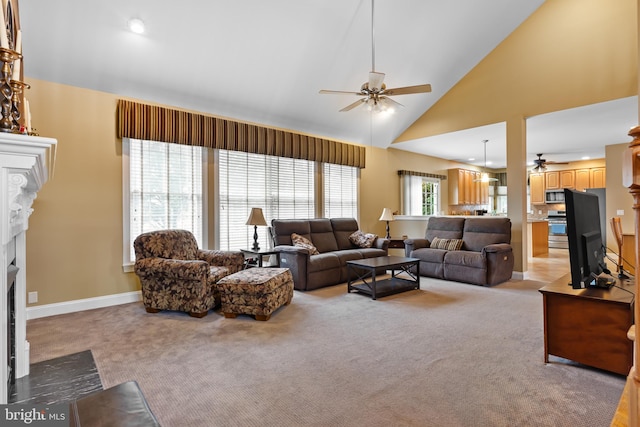 living room with light carpet, high vaulted ceiling, and ceiling fan