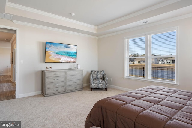 bedroom with crown molding and light colored carpet