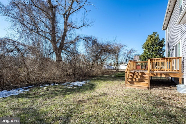 view of yard featuring a deck