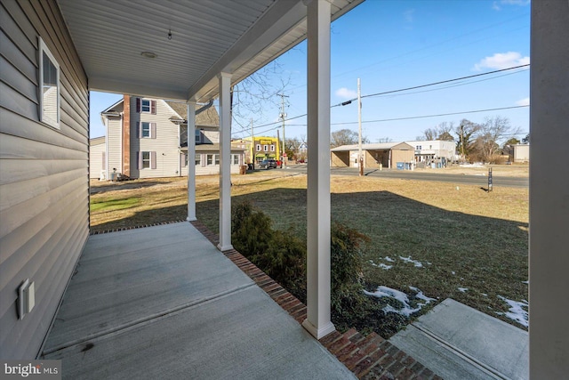 view of patio featuring a porch