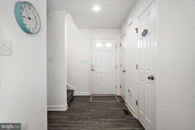 doorway to outside with dark hardwood / wood-style flooring