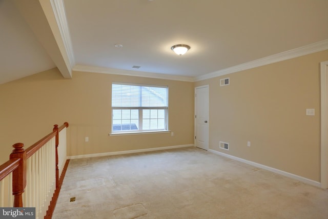 unfurnished room with light carpet, crown molding, and beam ceiling