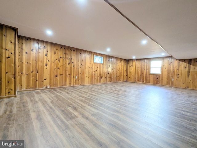 basement featuring light hardwood / wood-style flooring