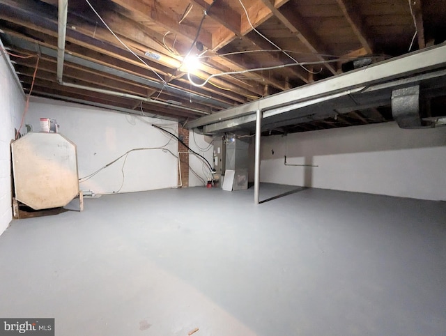 basement featuring heating unit