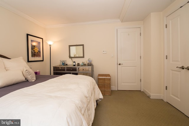 carpeted bedroom with ornamental molding