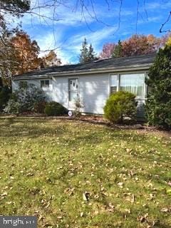 exterior space featuring a yard