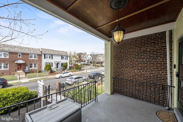 balcony featuring a porch