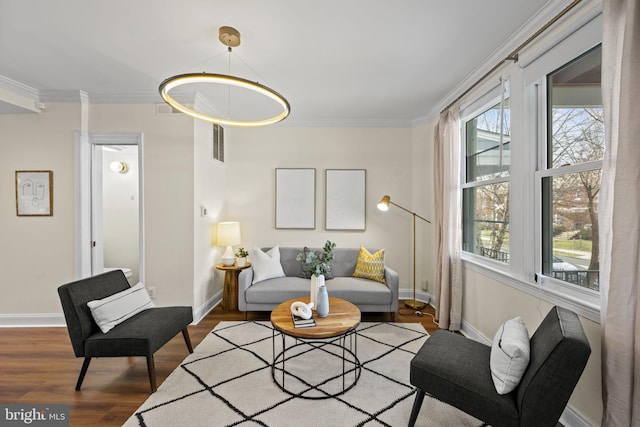 living room featuring ornamental molding and wood-type flooring