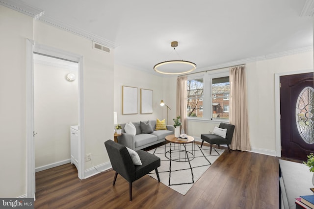 interior space featuring crown molding and dark hardwood / wood-style floors