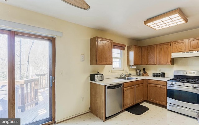 kitchen with appliances with stainless steel finishes and sink