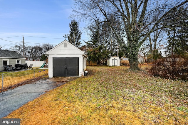 exterior space featuring a playground and a shed