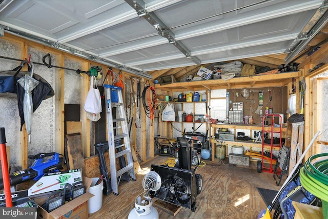 garage with a workshop area