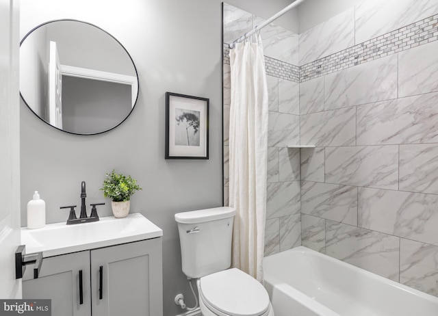 full bathroom featuring vanity, shower / bath combination with curtain, and toilet