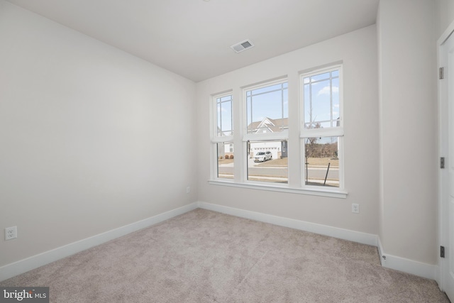 view of carpeted spare room