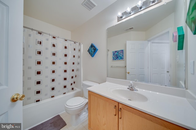 full bathroom with vanity, shower / bath combination with curtain, tile patterned floors, and toilet