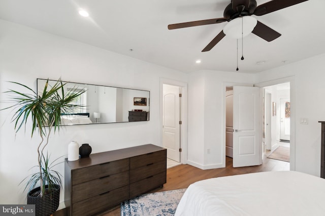 bedroom featuring ceiling fan and light hardwood / wood-style floors