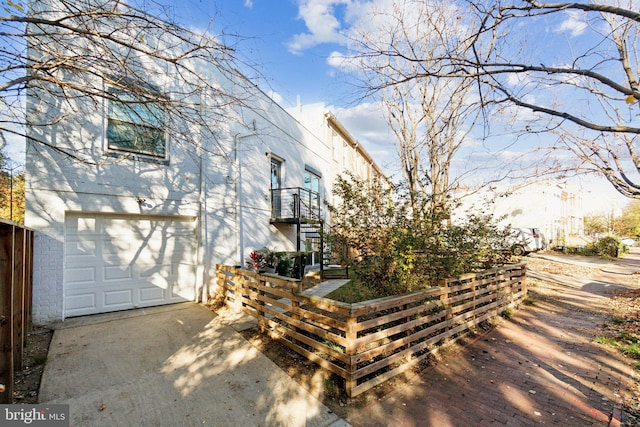 view of home's exterior with a garage