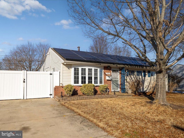 view of front of home with solar panels