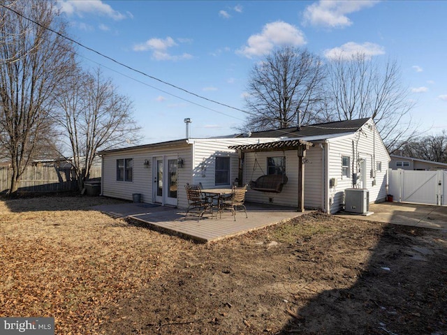 rear view of house featuring french doors, a patio, central AC unit, and a pergola