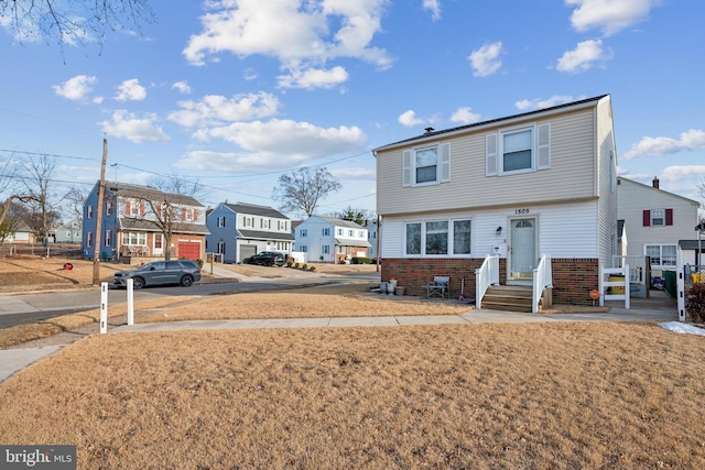 view of front of property with a front lawn