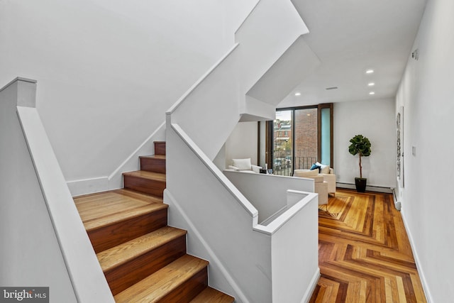 stairway with parquet floors