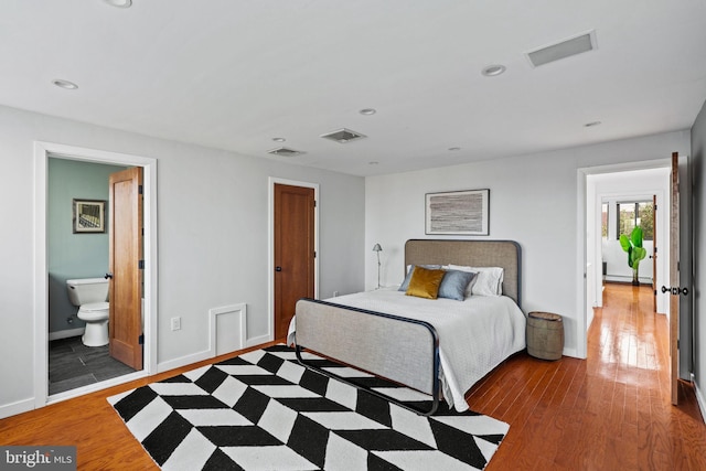 bedroom featuring hardwood / wood-style flooring