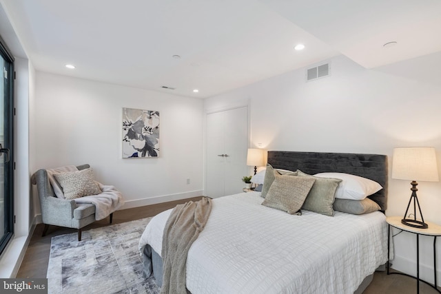 bedroom featuring hardwood / wood-style flooring