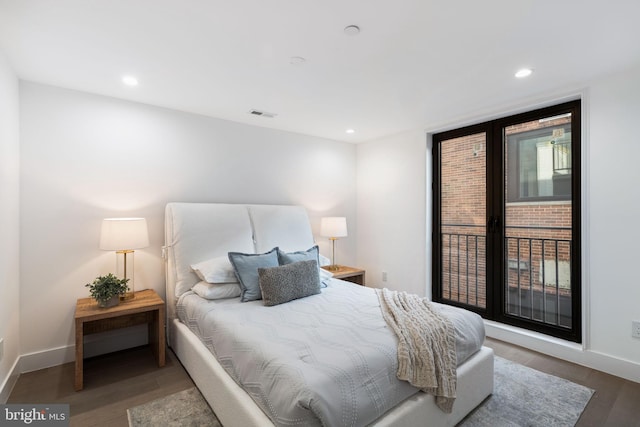 bedroom featuring wood-type flooring