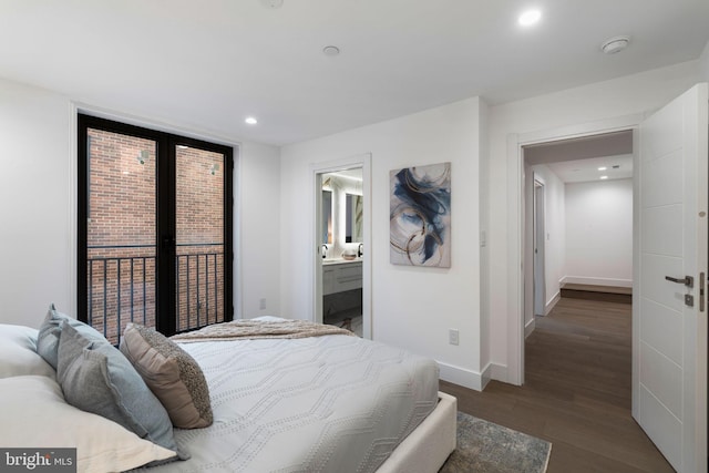 bedroom featuring dark hardwood / wood-style flooring