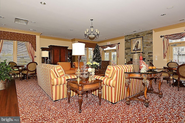 living room with ornamental molding and a chandelier