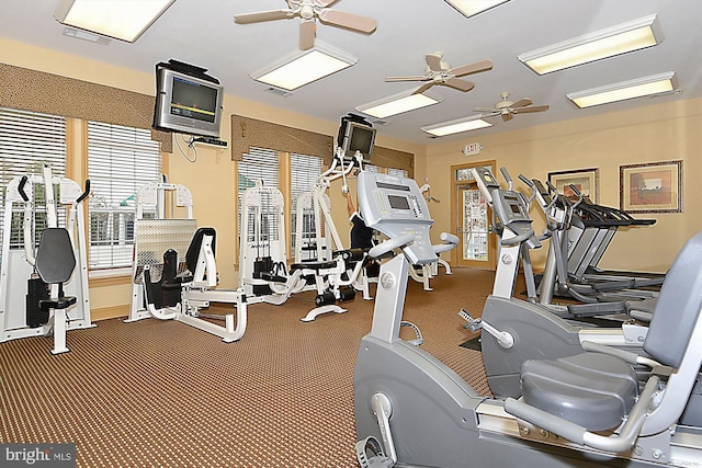 workout area with ceiling fan