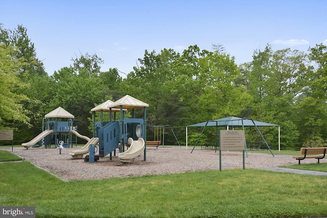 view of jungle gym with a yard