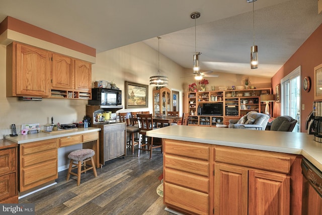 kitchen with vaulted ceiling, decorative light fixtures, dishwasher, ceiling fan, and dark wood-type flooring