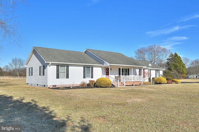 single story home with a front yard and a porch