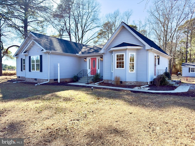 single story home featuring a front yard