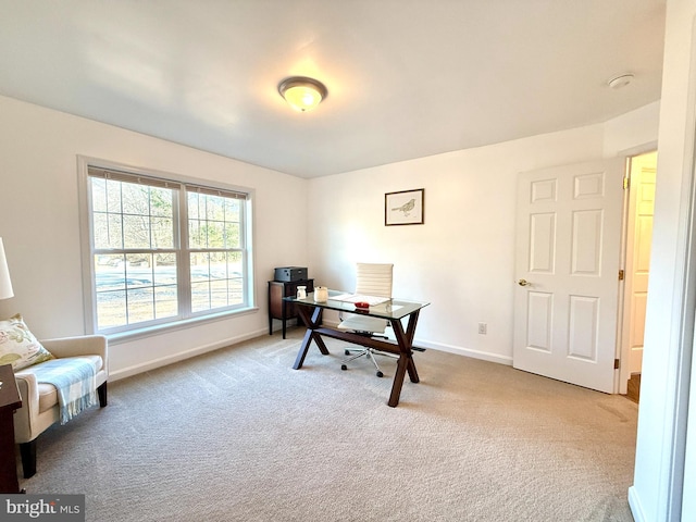 home office with light colored carpet