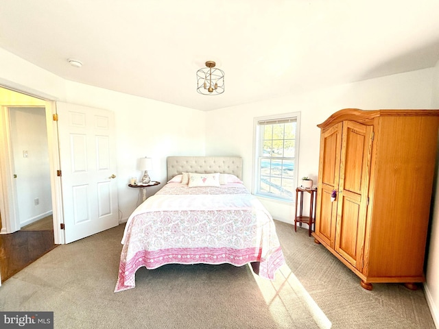 bedroom with light carpet