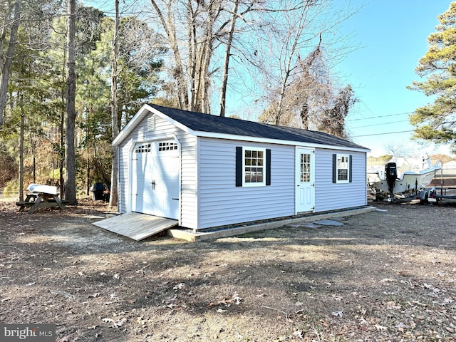 view of outdoor structure with a garage