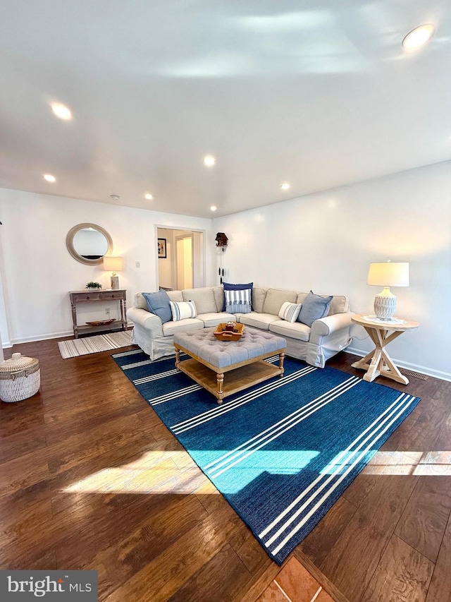 living room with dark wood-type flooring