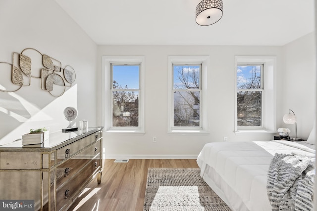 bedroom featuring light hardwood / wood-style flooring