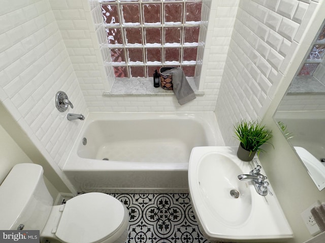 bathroom featuring sink and toilet