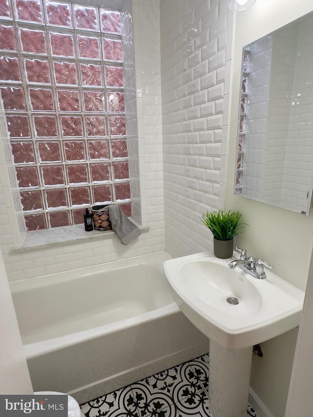 bathroom with tile patterned flooring