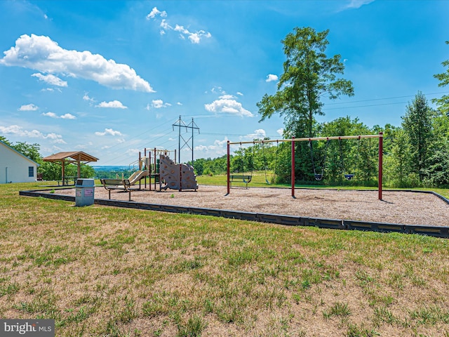 communal playground featuring a lawn