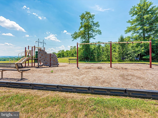 community playground featuring a yard